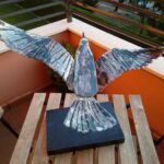 Pájaro de vidrio al vuelo